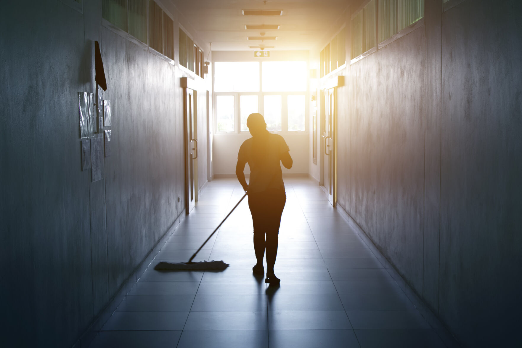Janitor Woman Mopping Floor In Hallway Office Building Or Walkway After School And Classroom Silhoue